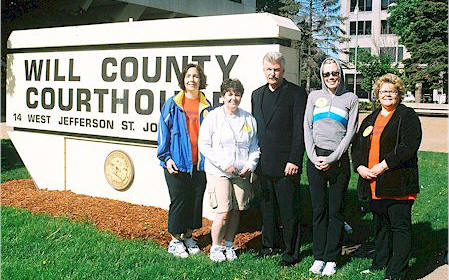 Jim Glasgow with the Will County Childrens Advocacy Centers staff (from left) Denise Payton, Mary Jane Pluth, Glasgow, Barbara Ficarello and Sue Bloch.